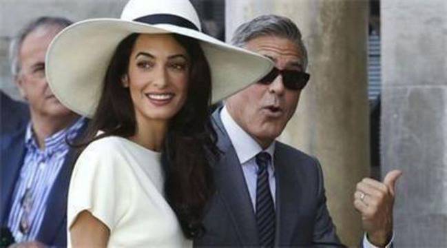 Жената на Клуни спасява сина на Кадафи от разстрел в последния момент
