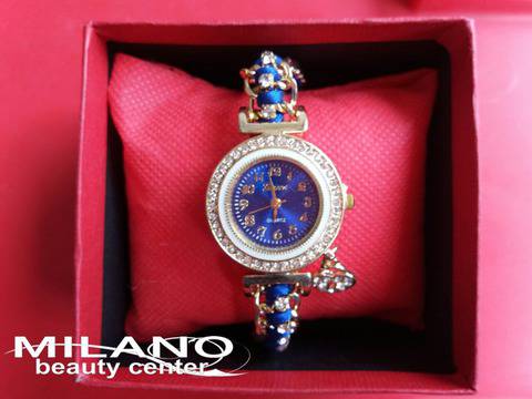 Нежен дамски часовник обсипан с полускъпоценни камъни и синя каишка