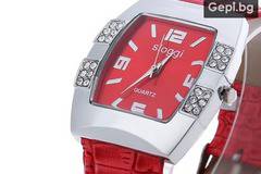 Дамски часовник с нестандартен червен циферблат, украсен с цирконии